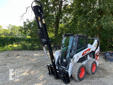 skid steer boom saw|skid steer limb buster.